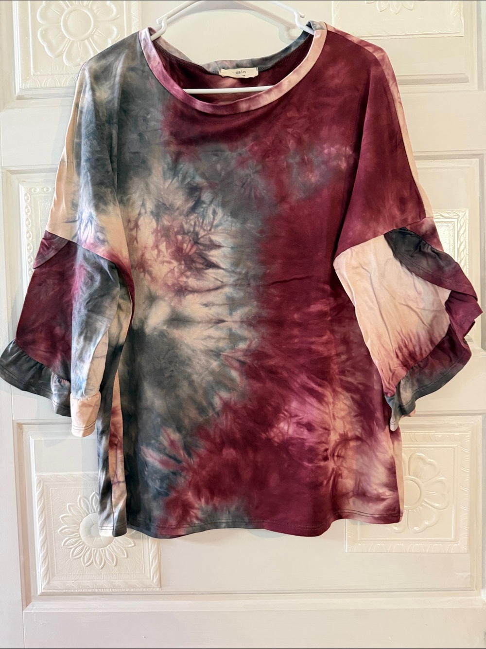 Amazing color in this top by a. again size medium.